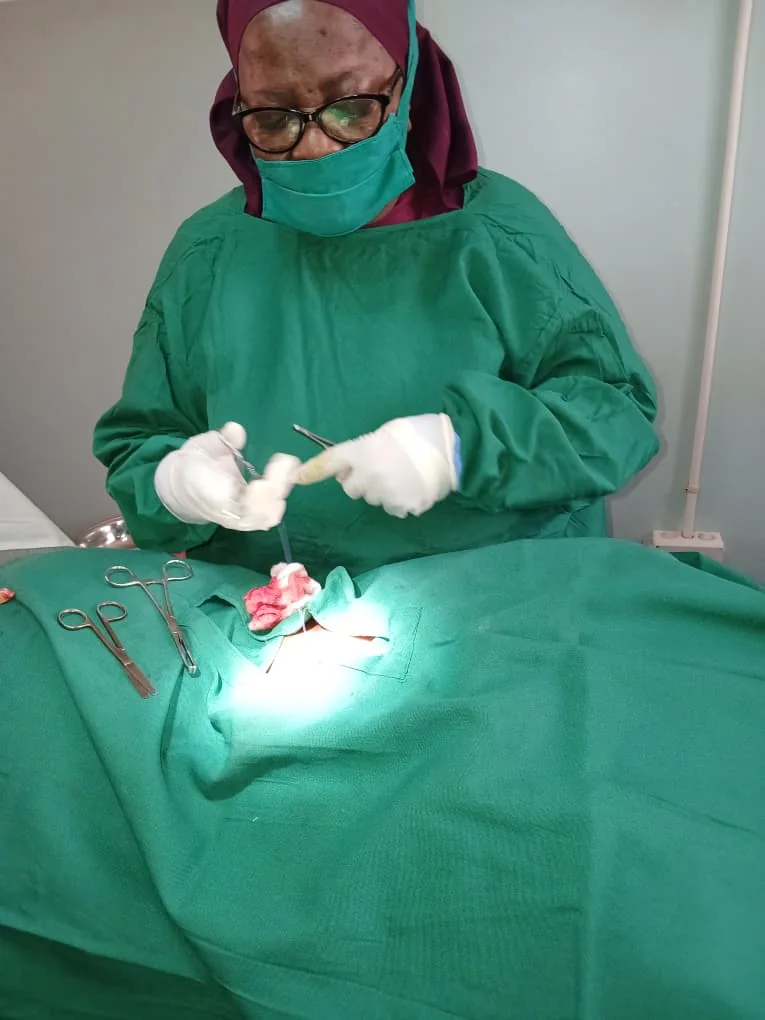 Sr. Avelina Temba performing a surgical procedure